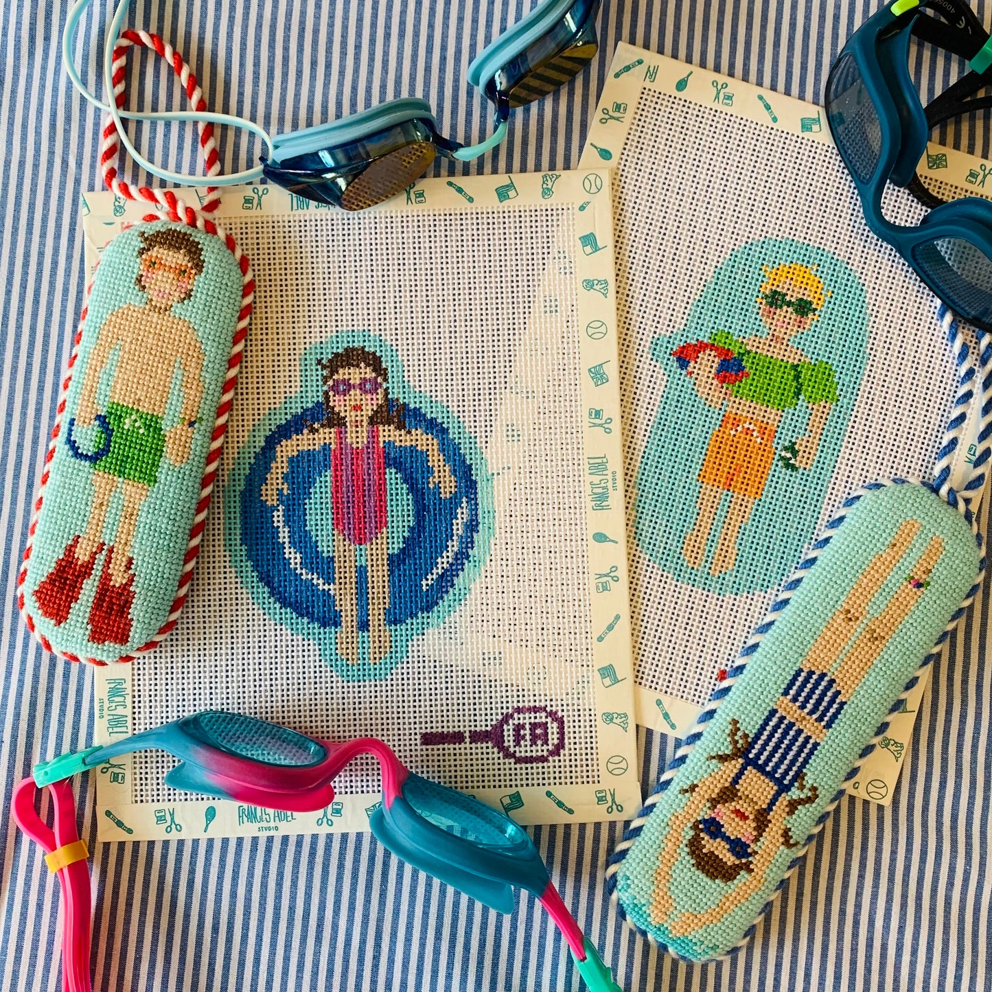 Pool Rats needlepoint canvas kit—retro pool-day swimmer designs in bright summer colors, 13-mesh DIY project