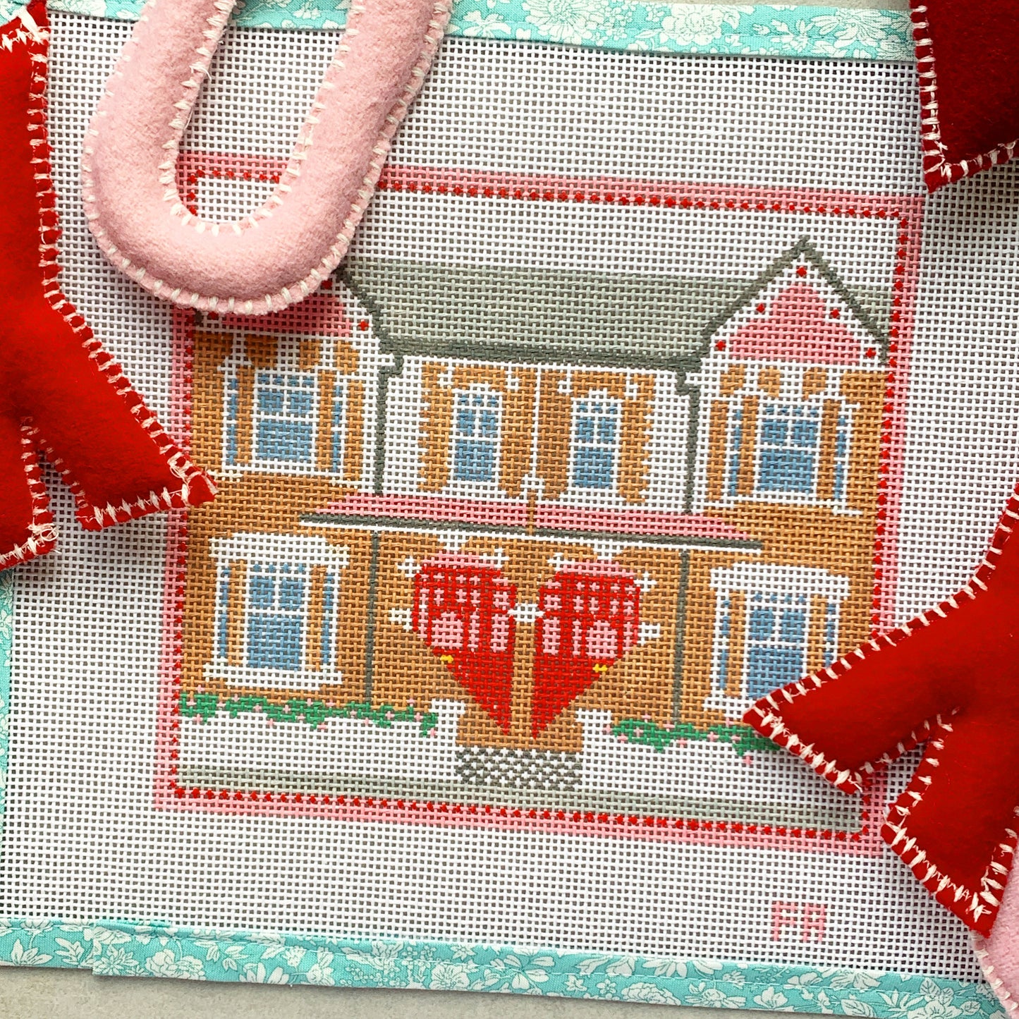 ‘Home is Where the ❤️ is!’ needlepoint canvas—two stylized houses forming a heart silhouette, 7.6 × 6.7″ on 13-mesh