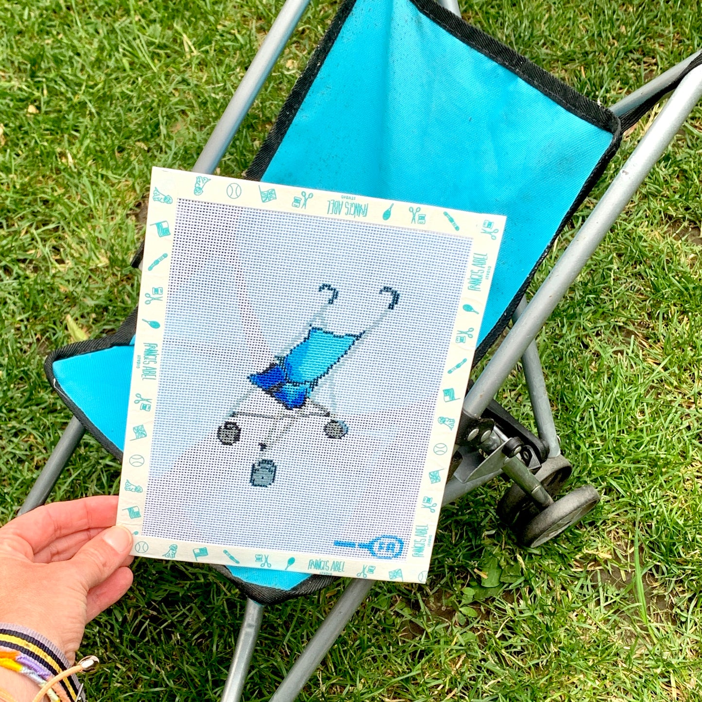 Toy stroller needlepoint canvas kit—blue umbrella pushchair design, 3 × 4½-inch on 18-mesh, DIY nursery décor project