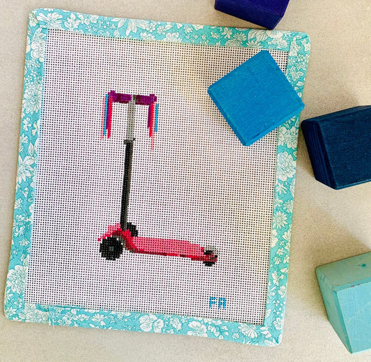 Pink children's scooter on 18 mesh canvas with streamers on the handles