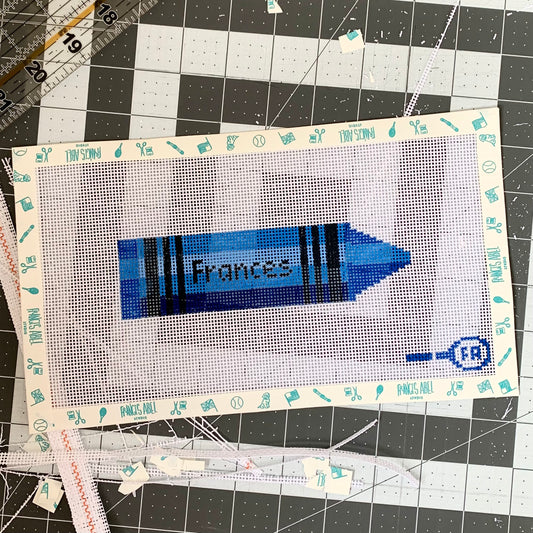  Custom crayon-shaped needlepoint canvas—red 13-mesh canvas printed with placeholder “NAME” in black block letters for DIY personalized décor