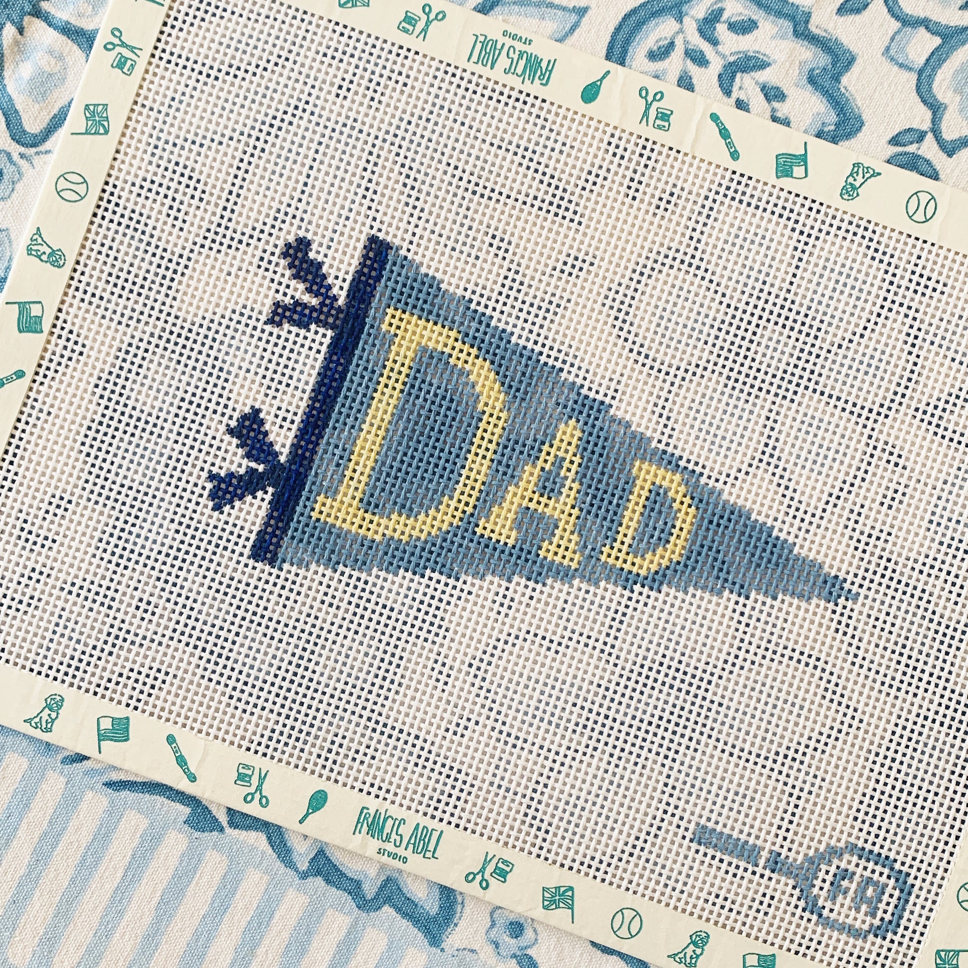 Dad pennant needlepoint canvas kit, retro banner design in blue and cream, 13-mesh DIY Fathers Day gift project
