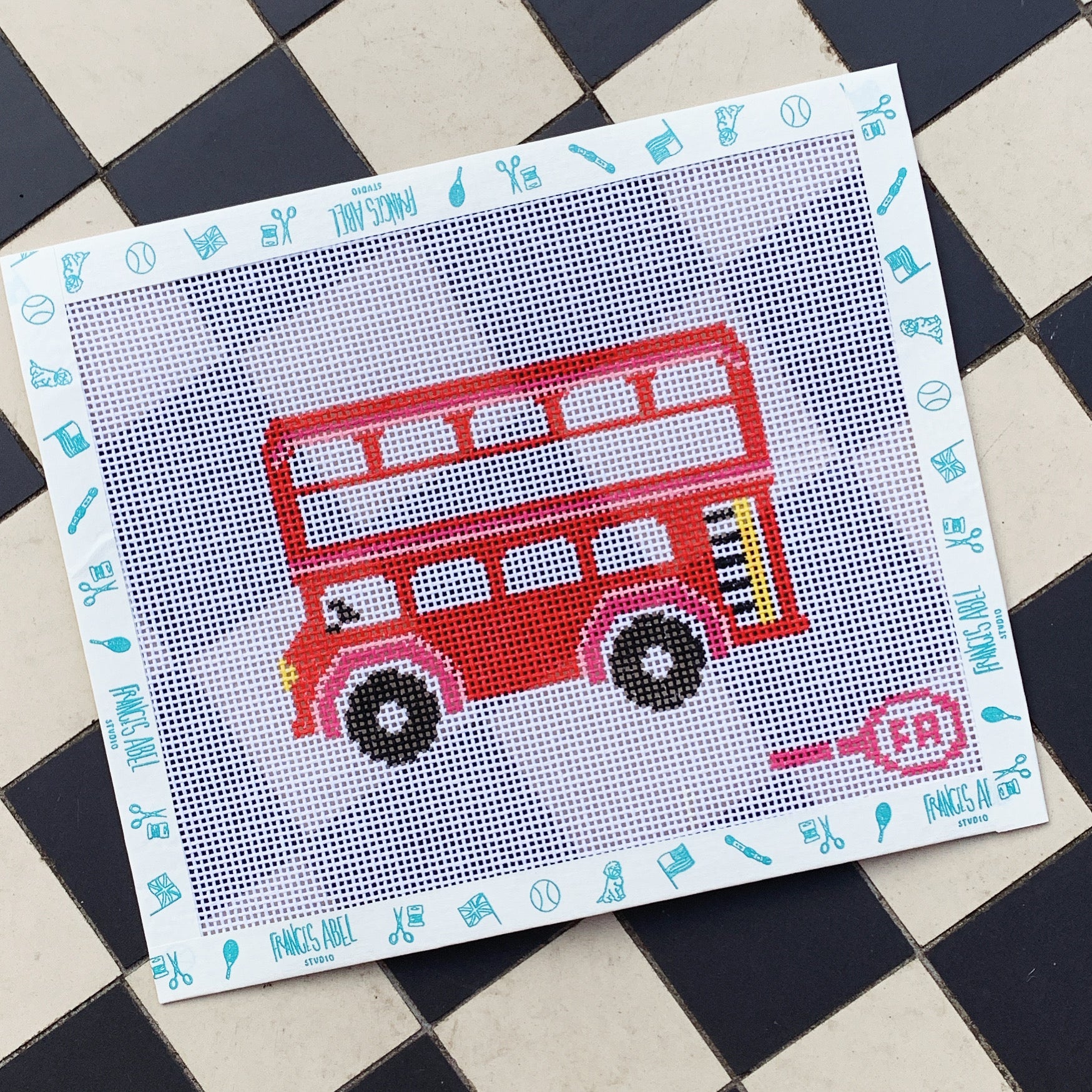 Classic red double-decker London bus needlepoint canvas—stylized bus design on natural 13-mesh canvas, DIY transport décor project
