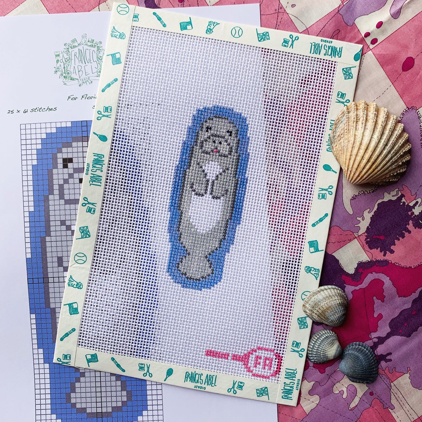Mini manatee needlepoint chart—gray manatee floating in aqua water, small square design on 18-mesh, DIY ornament pattern
