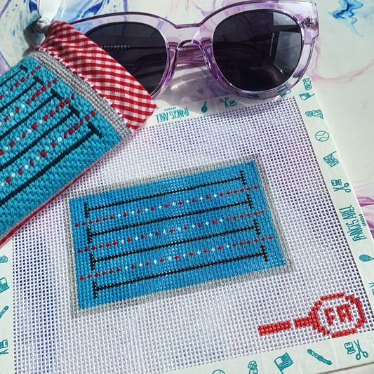 Swimming Pool ornament needlepoint canvas kit—rectangular turquoise pool with black lane stripes on 13-HPI Zweigart mesh, styled flat with purple sunglasses and red-gingham lined sunglass case
