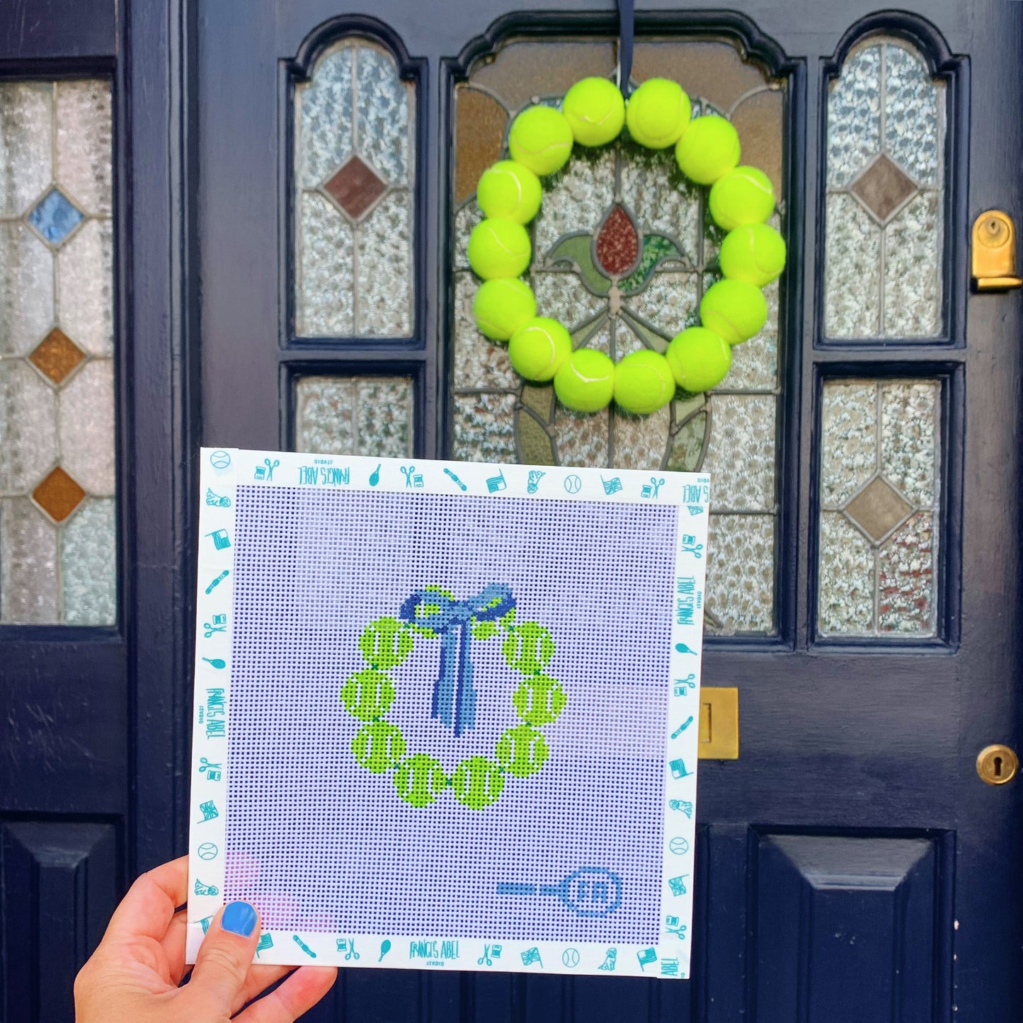 Tennis wreath needlepoint canvas kit—3.5″ square natural 13-HPI mesh printed with a ring of bright yellow tennis ball motifs for DIY front-door décor 