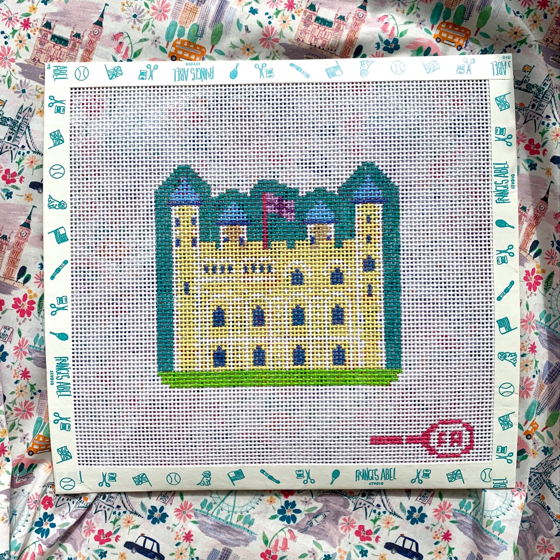 Tower of London needlepoint canvas kit—stylized fortress silhouette in bold pink and teal, 4.75 × 4.25″ on 13-mesh DIY décor project
